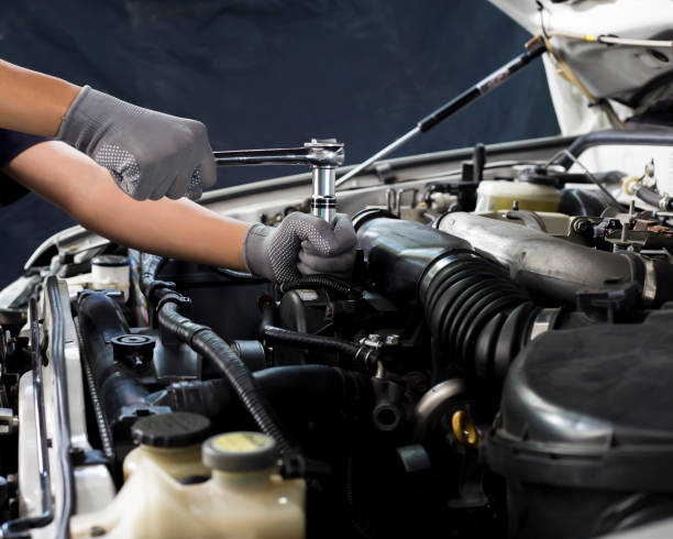 istock Car mechanic working on car engine, car maintenance concept. 1331411550