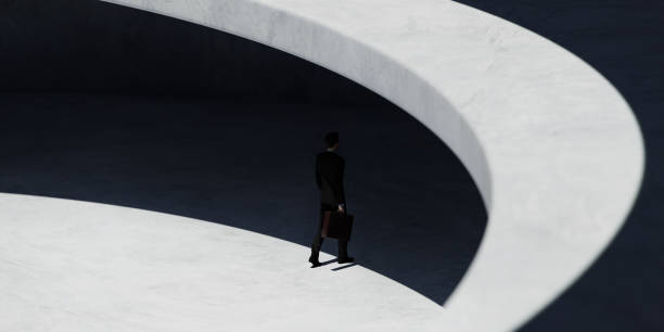 istock Businessman walking in the shadow. 1331412878