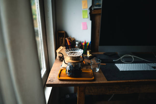 istock drip coffee in house,Pouring a hot water over a drip coffee 1331413045