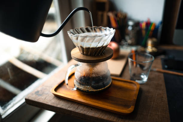 istock drip coffee in house,Pouring a hot water over a drip coffee 1331413199