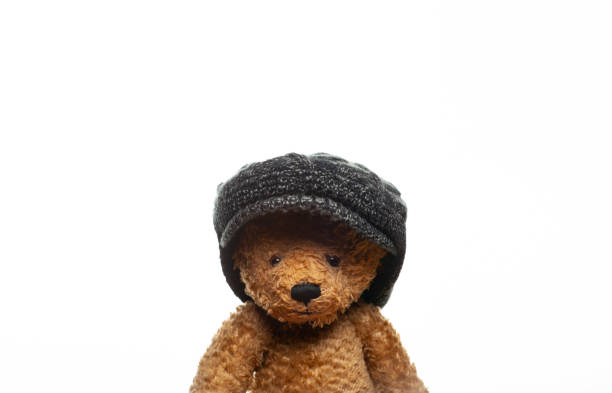 image of toy bear cap white background
