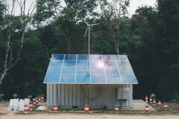 istock Solar panel on a red roof reflecting the sun and the cloudless blue sky 1331417885