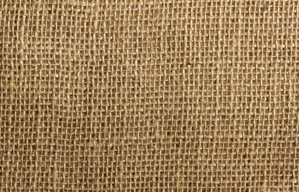 istock Burlap texture closeup. Background from a rough burlap fabric. 1331425967