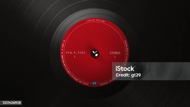 Black Vinyl Record On A Turntable A Black Vinyl Background With A Red Sticker In The Center For Your Text Dj Disco Trends 60s 90s Stock Photo - Download Image Now