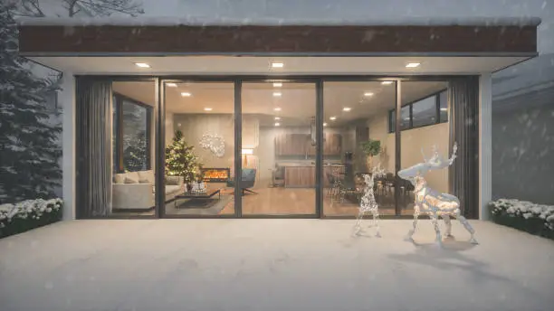 Christmas decorated luxury house in snowy weather.