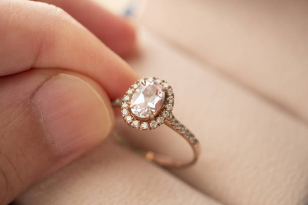 istock hand hold beautiful jewelry diamond ring 1331428099
