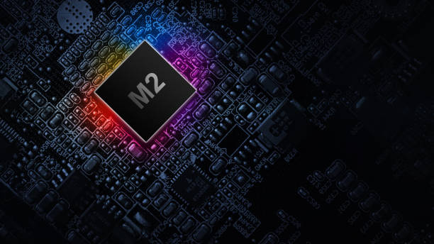 M2 processor chip. Network digital technology with computer cpu chip on dark motherboard background. Protect personal data and privacy from hacker cyberattack. M2 processor chip. Network digital technology with computer cpu chip on dark motherboard background. Protect personal data and privacy from hacker cyberattack m2 machine gun photos stock pictures, royalty-free photos & images
