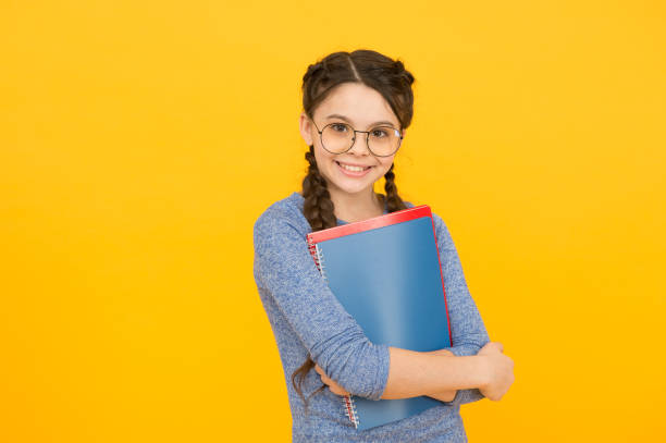 istock Library concept. Get ready for classes. Inspiring education. Private schooling. Cute smiling schoolgirl. Girl little schoolgirl. Pupil with braids going to school. Schoolgirl daily life. School club 1331432748