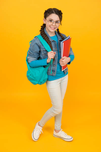 istock Student smart cute girl goes classes for gifted children, language courses concept 1331432758