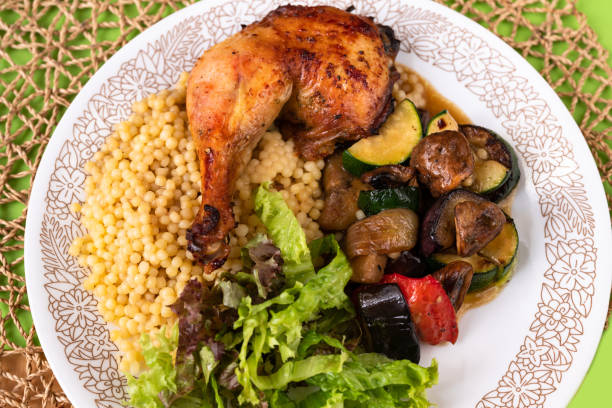 istock Baked chicken leg, fried vegetable piece, salad, vegetable,pasta. 1331436692