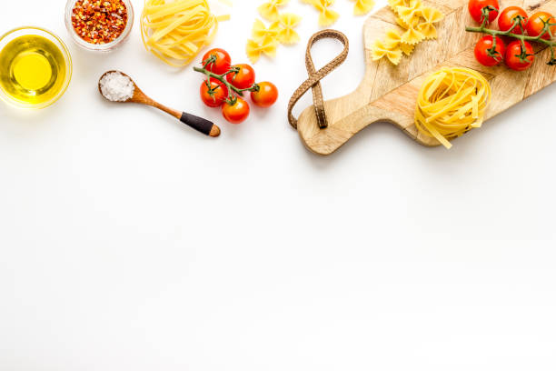 istock Fettuccine with ingredients for cooking italian pasta 1331438658