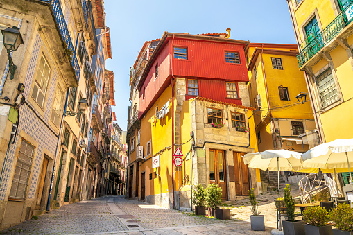 Charming traditional colorful houses on the historic embankment of Porto, Portugal