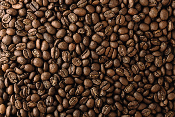 istock coffee beans texture. offee beans as background. close-up of offee beans top view 1331442274