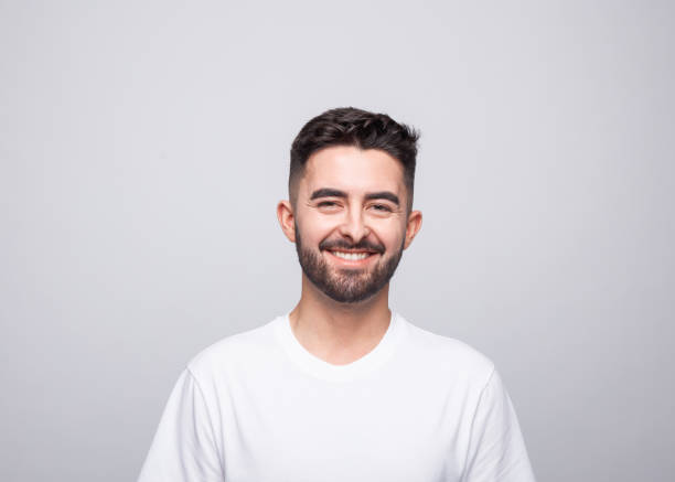istock Headshot of happy young man 1331445928