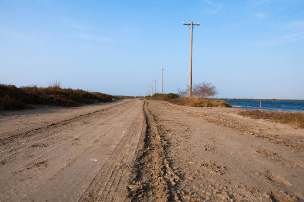 istock Tire track forward on the way against blue sky. 1331447264