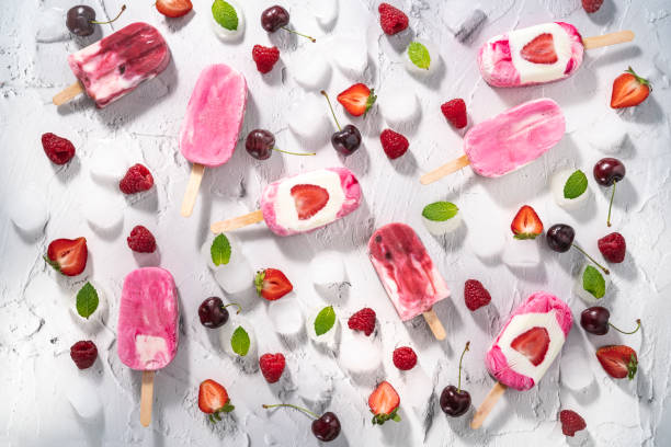 istock Berries assorted homemade popsicles on white with strawberries, raspberries cherry and blackberries 1331449080