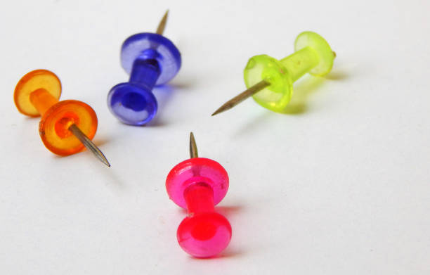 istock view of pushpins  or tacks on white background 1331449112