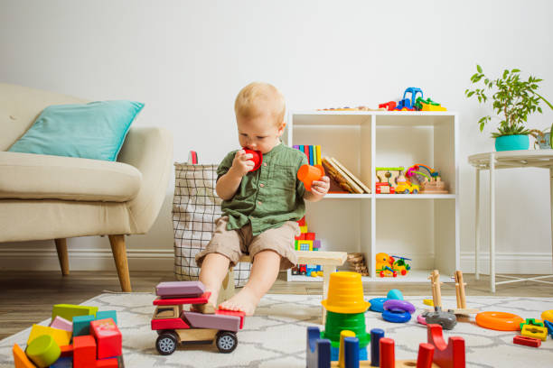 istock Boy Playing With Toy At Home 1331449299