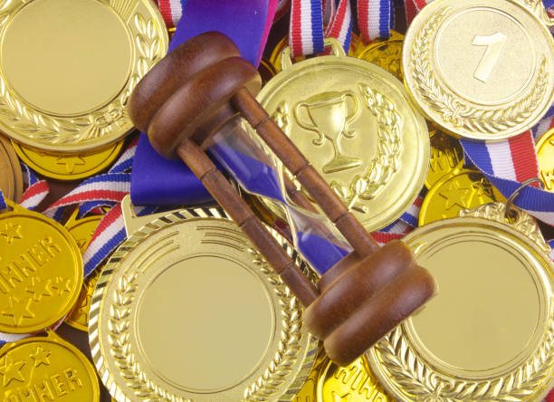 istock Hourglass on gold medals 1331450003