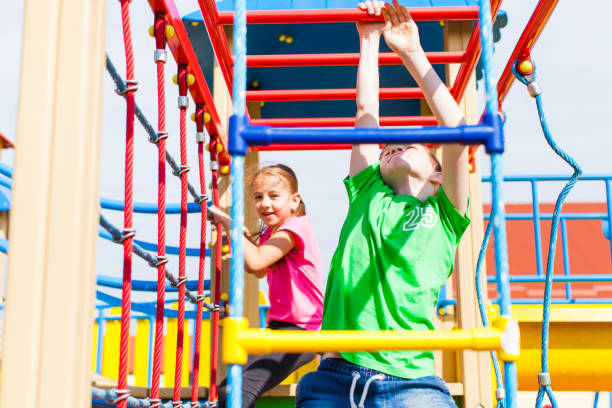 istock Children Playing On Slide At Playground 1331450562
