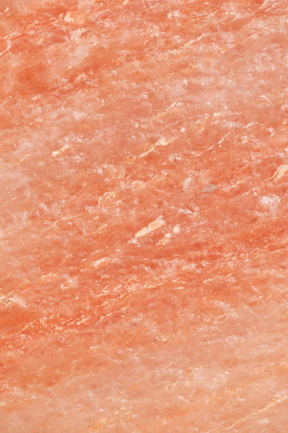 close-up photo of pink himalayan rock salt. - pink salt imagens e fotografias de stock