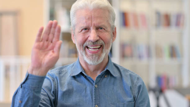 istock Cheerful Senior Old Man Waving, Hello 1331452678