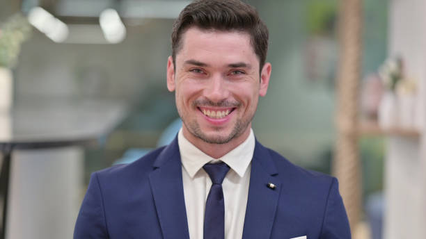 istock Young Businessman saying Yes by Shaking Head 1331453315