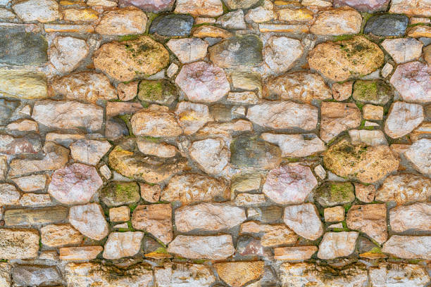 stone background brown and sandy cobblestone fort wall solid - color image solid brown bumpy imagens e fotografias de stock