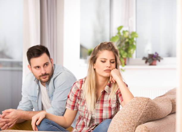 istock Young couple arguing at home 1331459344