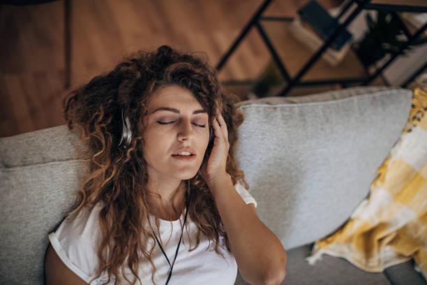 istock Woman relaxing at home 1331465585