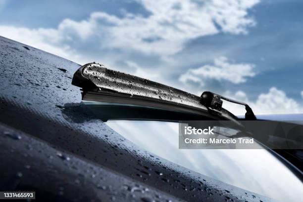 Closeup Of Wet Windshield Wiper Wipping Windscreen Outside Stock Photo - Download Image Now