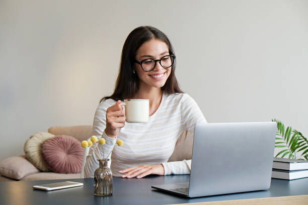 istock Brunette woman working from home. 1331467920