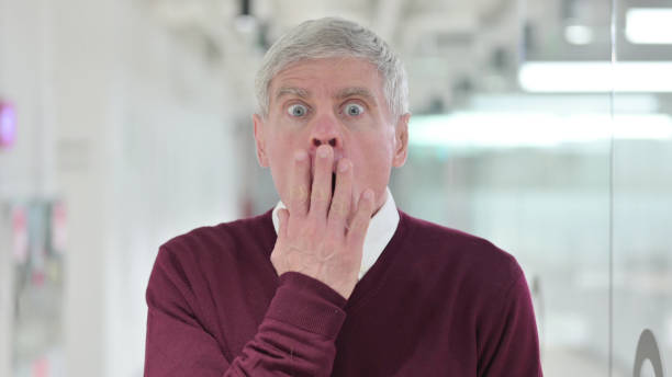 istock Shocked Middle Aged Man Shocked by Results 1331472853