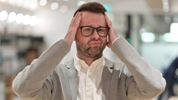 istock Disappointed Casual Young Man reacting to Loss, Failure 1331472997