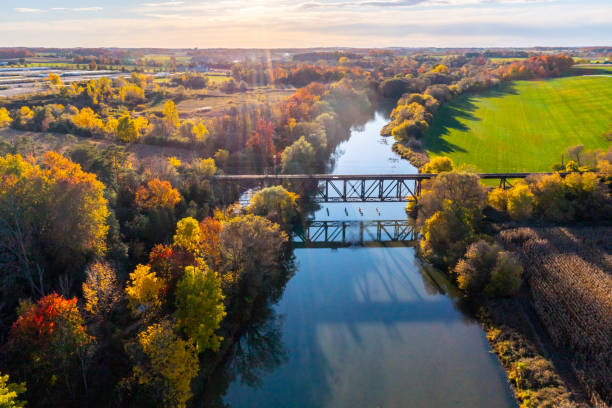 istock Aerial Railway Bridge and Conestogo River at dusk, St. Jacobs, Canada 1331477018