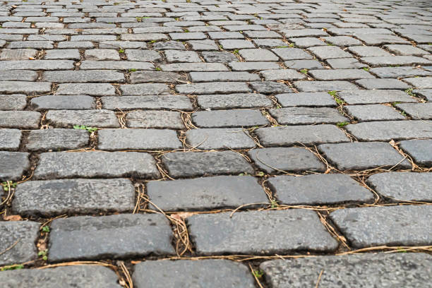 istock gray cobblestone paving stone pattern city square 1331482605