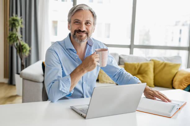 istock Mature man working on the laptop 1331484636