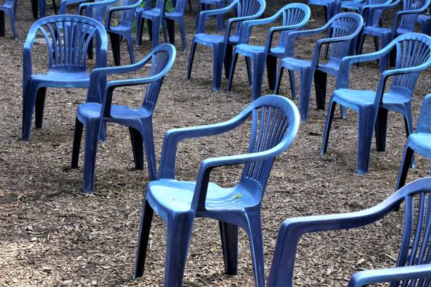 istock rows of chairs in the park 1331485605