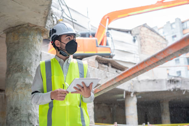 istock 30-year-old male engineer is in the middle of work, reviewing documents from his electronic tablet 1331495914