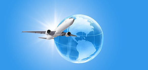 Airplane flying around the earth globe. Traveling and vacation concept