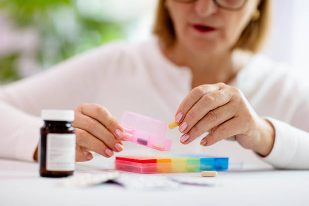istock Pill box for senior patient. Medicine container. 1331498193
