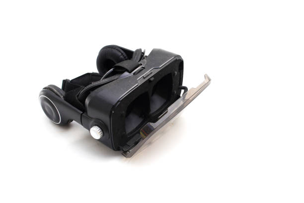 istock Black VR box or virtual reality glasses isolated on white background. 1331503635
