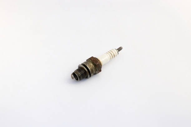 istock Old used spark plug isolated on white background. 1331504395