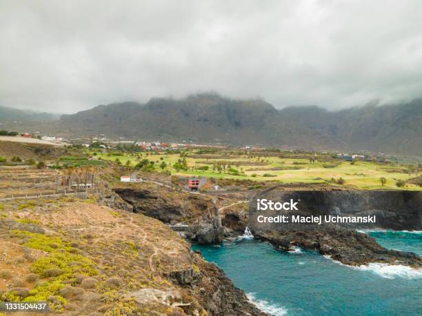 Tenerife Buenavista Del Nte A Town On The Atlantic Ocean Sunny Coast And Golf Course And Banana Plantation Ocean Water Waves Blue Ocean Stock Photo - Download Image Now