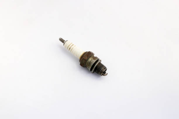 istock Old used spark plug isolated on white background. 1331504538