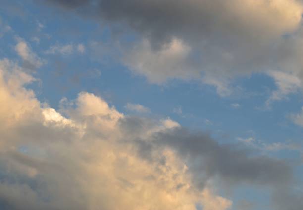 istock Cirdle gray-white clouds in the rays of sunset . 1331508482