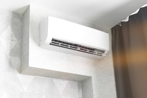 Air conditioner system on white wall living room interior, modern design concept background photo