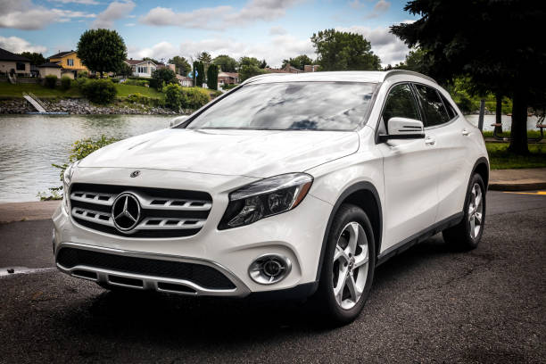 Mercedes Benz GLA 250 2019 white car outdoor shot at summer Sorel-Tracy, Canada - July 30, 2021: Mercedes Benz GLA 250 2019 white car outdoor shot at summer canada close up color image day stock pictures, royalty-free photos & images