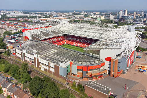 Aerial view of Old Trafford Stadium, home of Manchester United Football Club in Manchester, England, UK