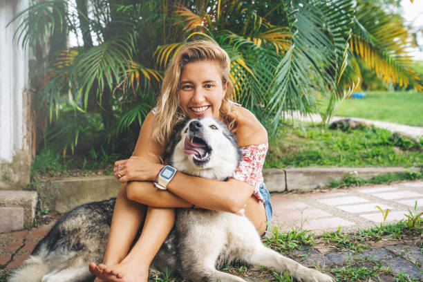 istock Young Woman  With Her Dog 1331512114